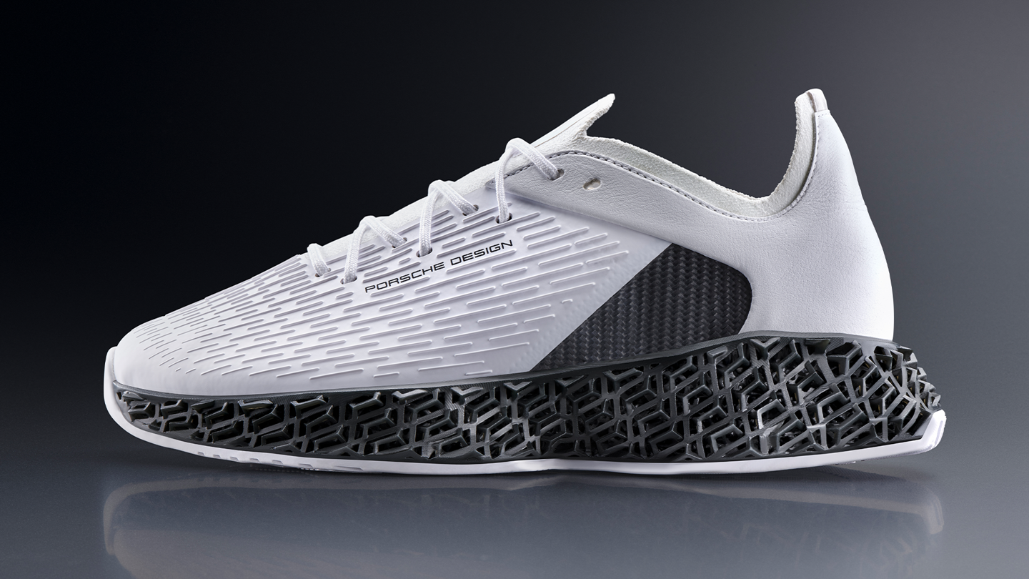 Shows Picture of White-3D-Matrix-Sneaker-Side-View-on-Black-Background.png