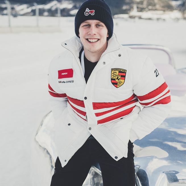 Shows Picture of Ferdi_Porsche_In_Snow_Porsche_Jacket.png