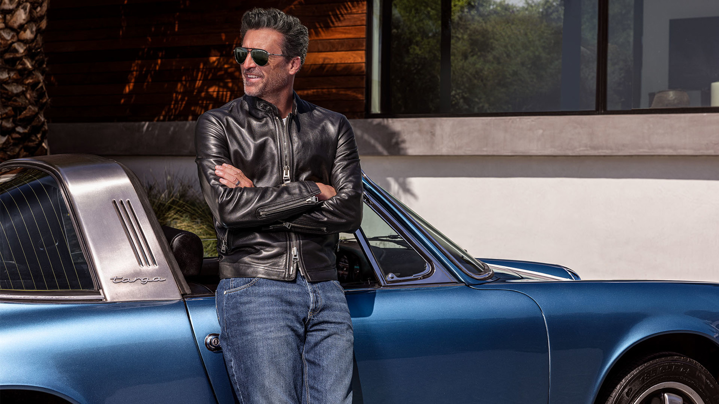 Shows Picture of Patrick_Dempsey_Eyewear_Blue_Targa_Sunglasses_0001_PD_05_Driveway2_325 - 006 JMB FINAL.jpg