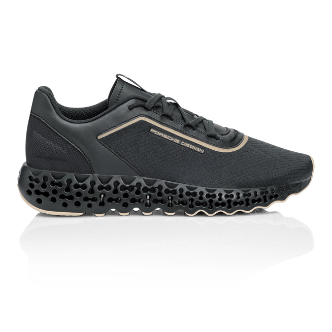 Shows Picture of Xetic_Sneaker_Side_View_Black_Gold_details.png