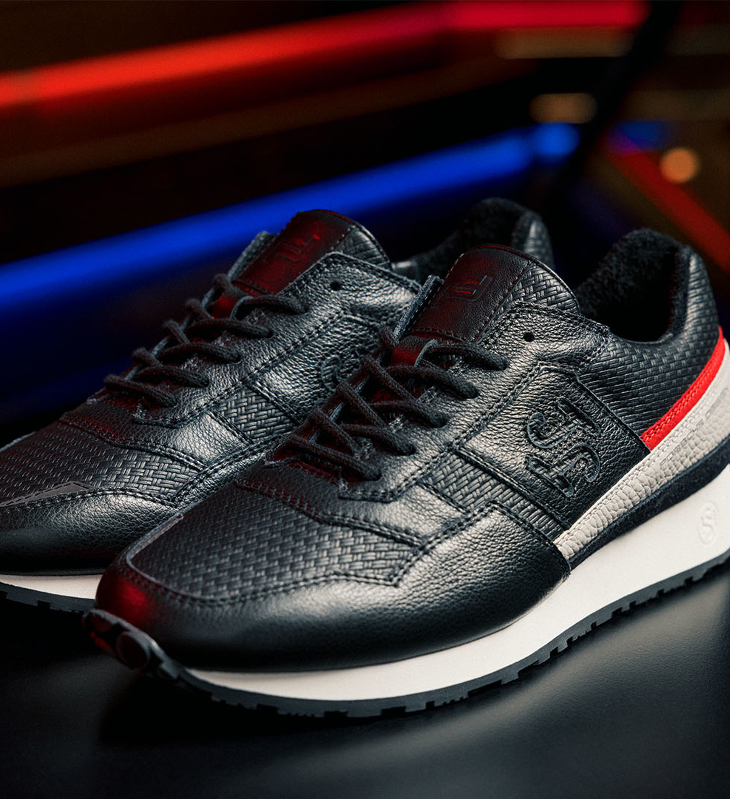 Shows Picture of Sonra_Sneaker_Present_Black_Red_Sonra_Logo_0000_2022_PDxSonra_Present_RGB_1.jpg