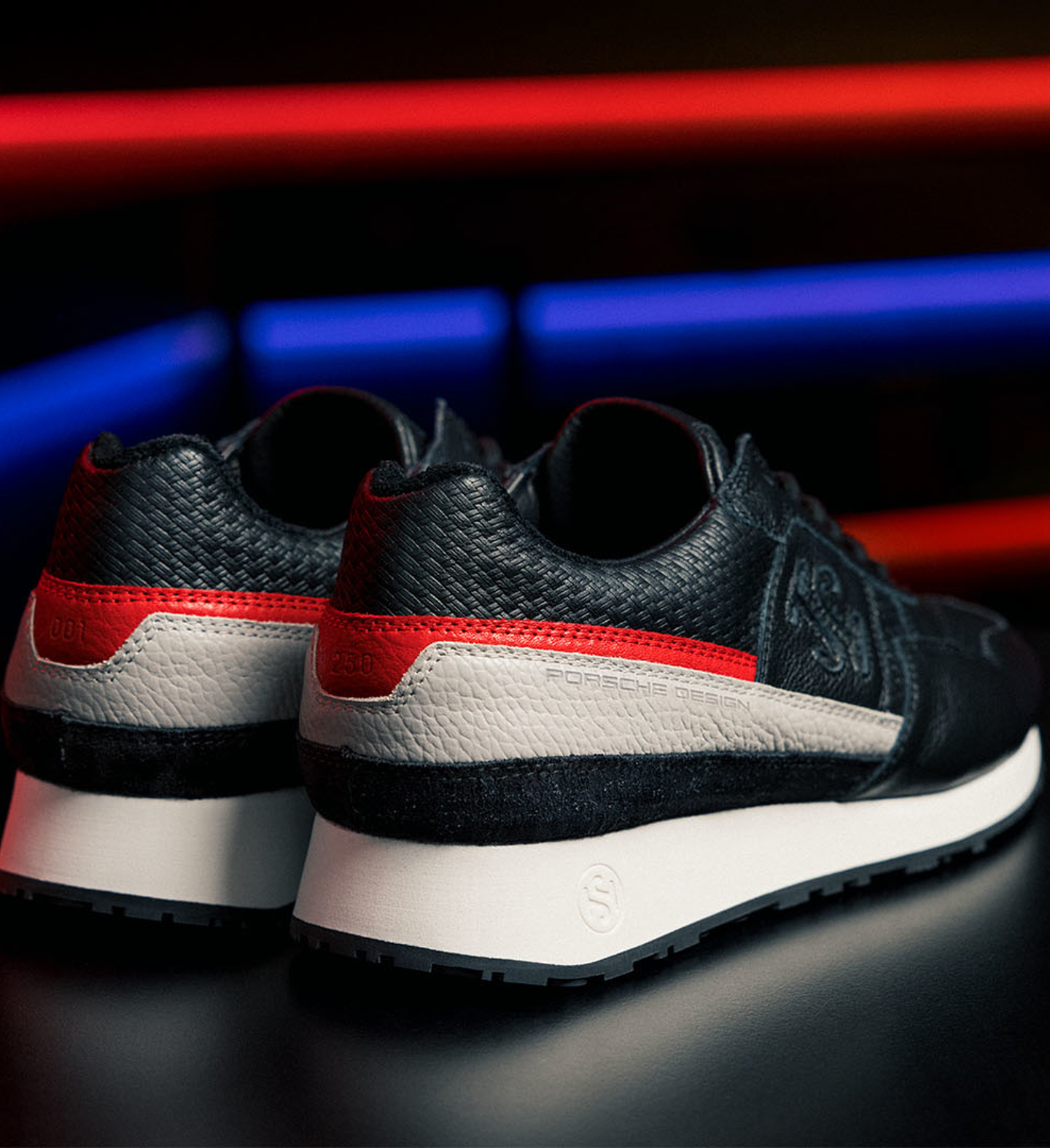 Shows Picture of Sonra_Sneaker_Present_Black_Red_Sonra_Logo_0001_2022_PDxSonra_Present_RGB_3.jpg