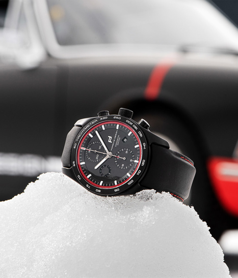 Timepiece laying on snow