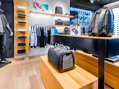 Shows Picture of Store-Frankfurt-Inside-View-Table_Bags_Shirts.jpg